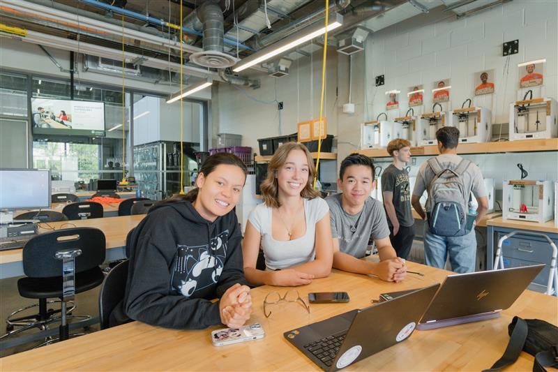 Students behind laptops