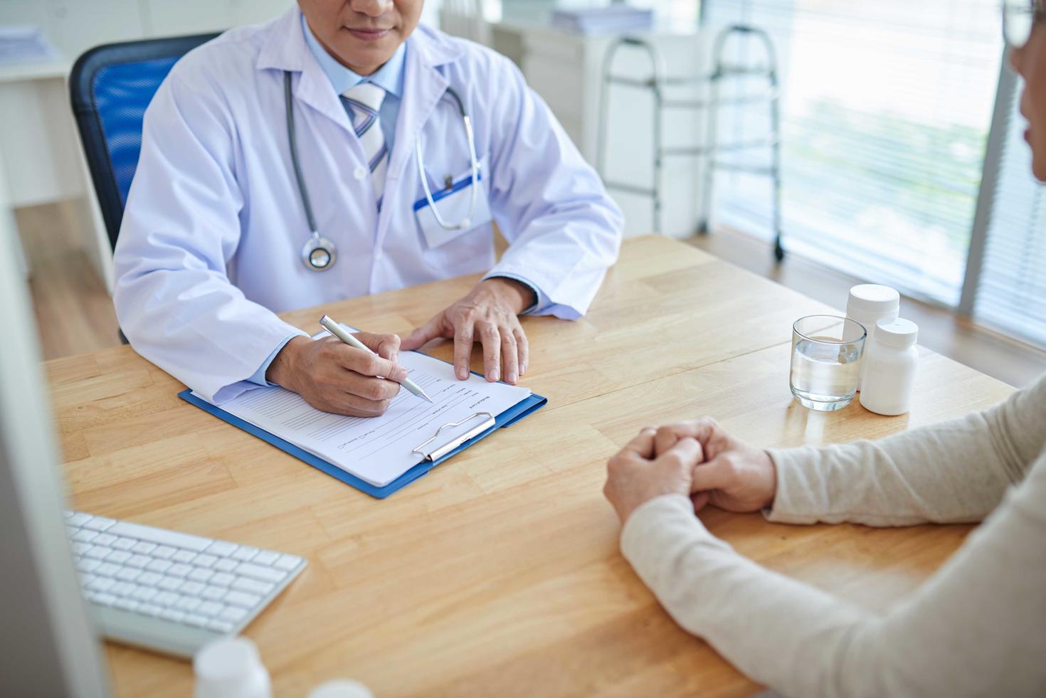 A physician talking to a patient