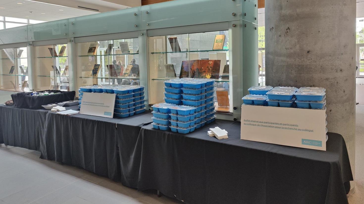 stacks of Friendlier reusable containers for conference lunches