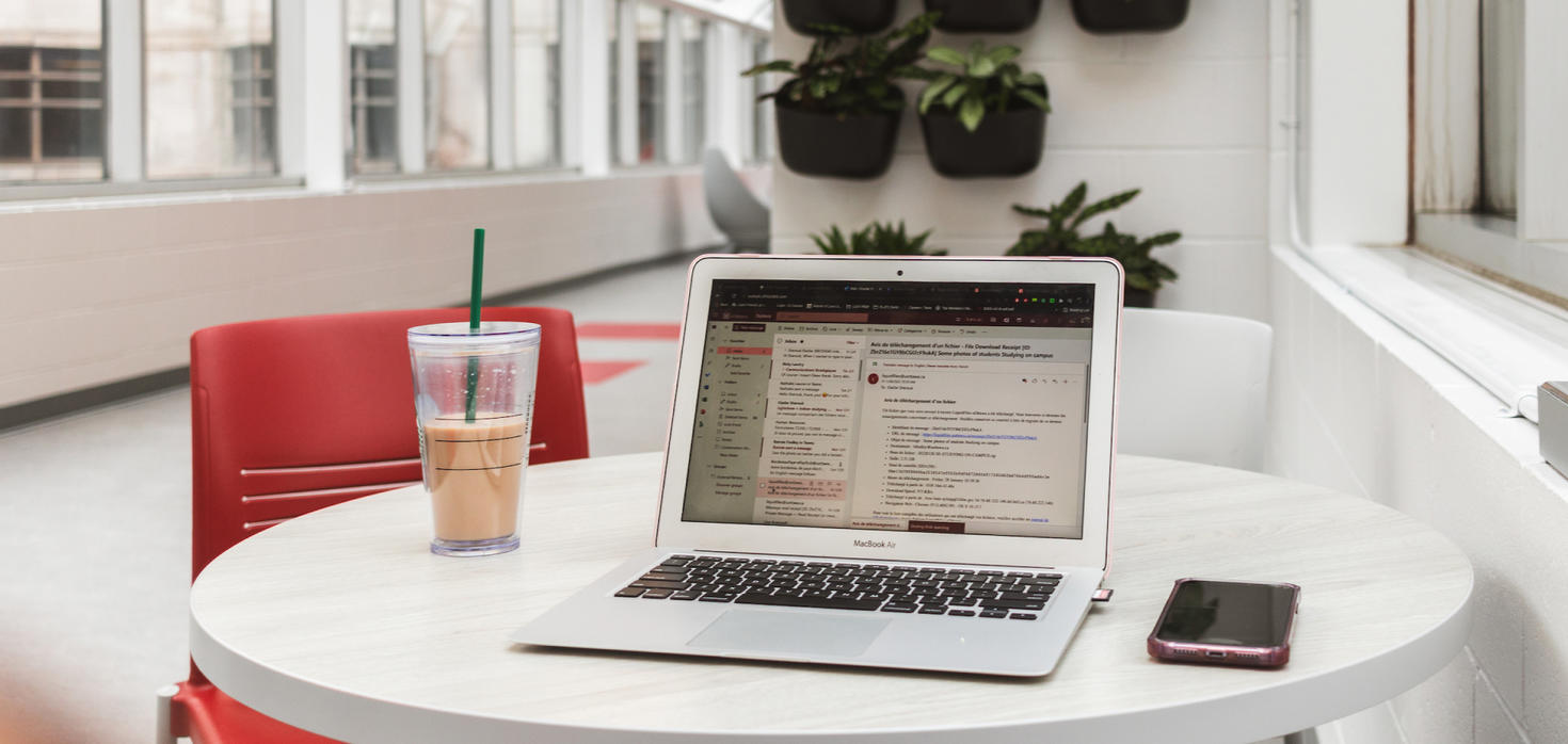 Laptop and iced coffee