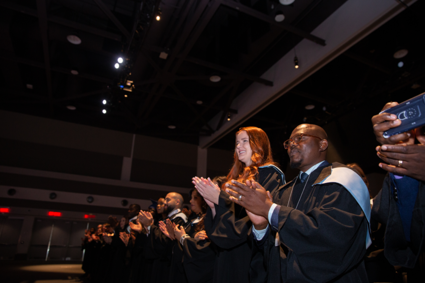 Graduate Students applauding