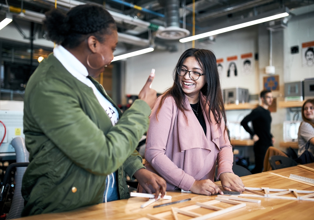 Two people take part in a workshop.