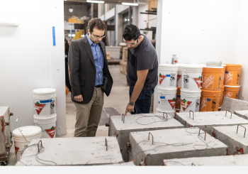 Dr. Sanchez with a team member in his research lab