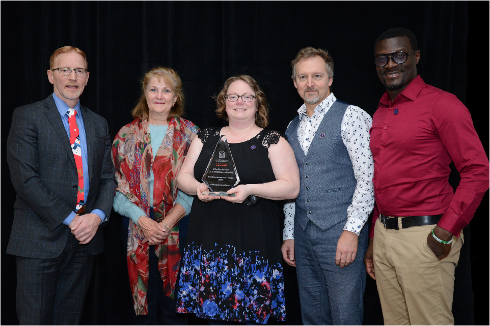 Dr. Jasmin, Dean of the Faculty of Medicine, with members of Francophone Affairs, winner of the 2019 Team Service Excellence award.