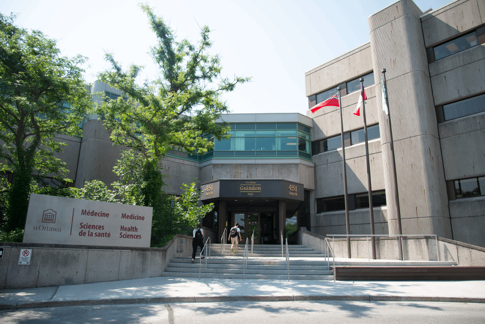 A view of the entrance of Roger Guindon hall.