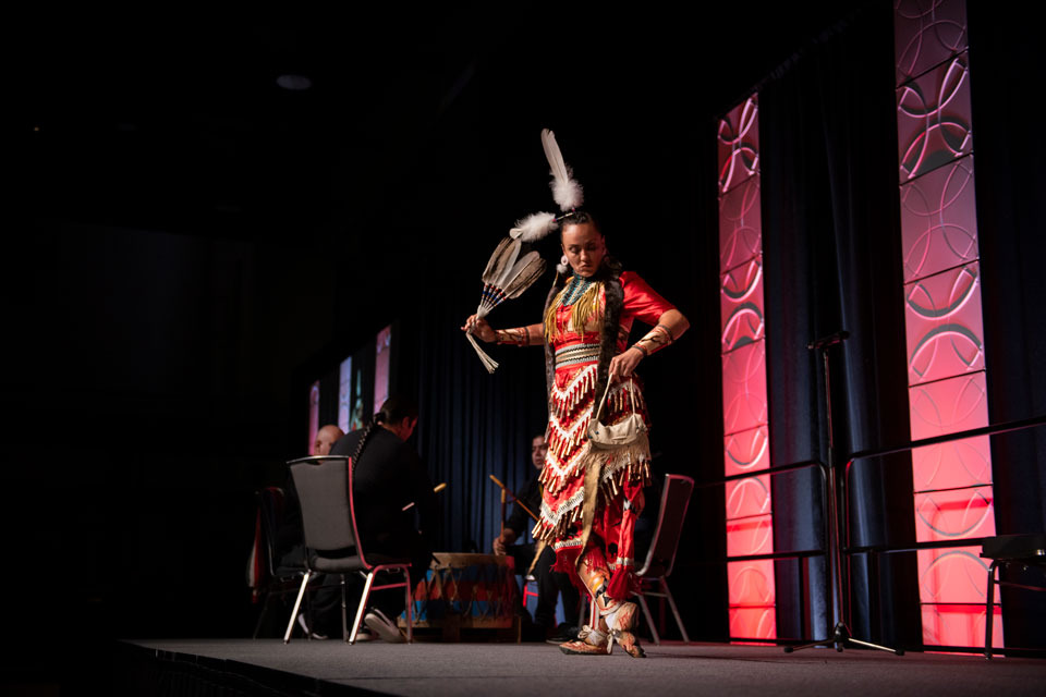 A woman dances on stage.