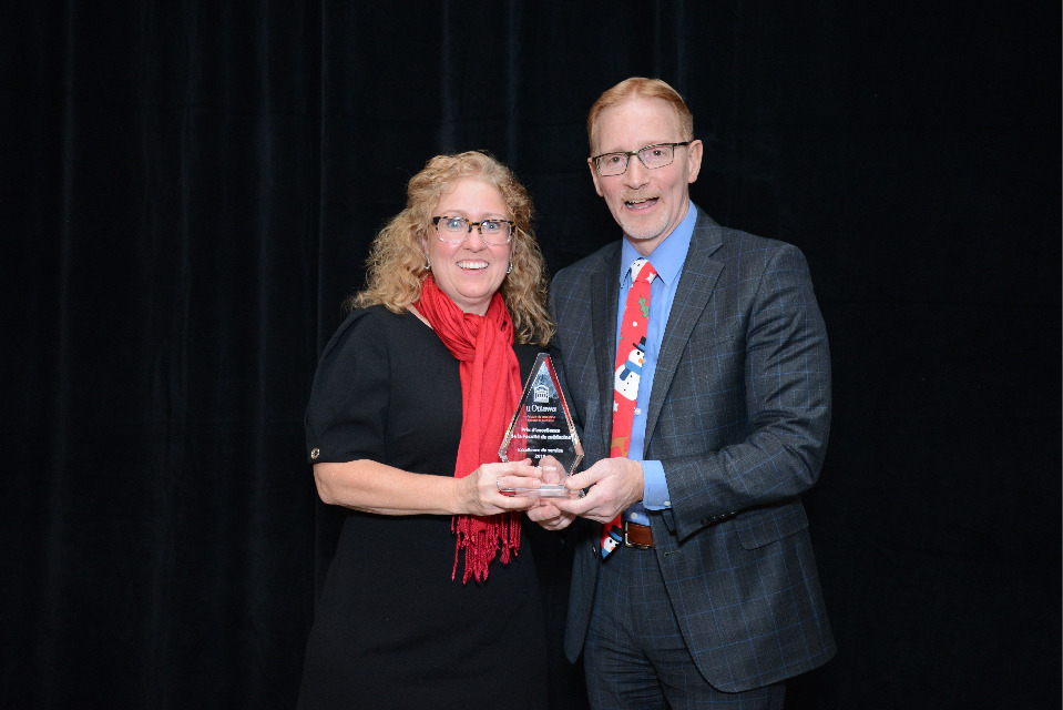 Dr. Jasmin, Dean of the Faculty of Medicine, with Danielle Caron, 2019 Service Excellence award winner.