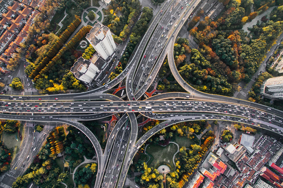 A large highway interchange filled with traffic.