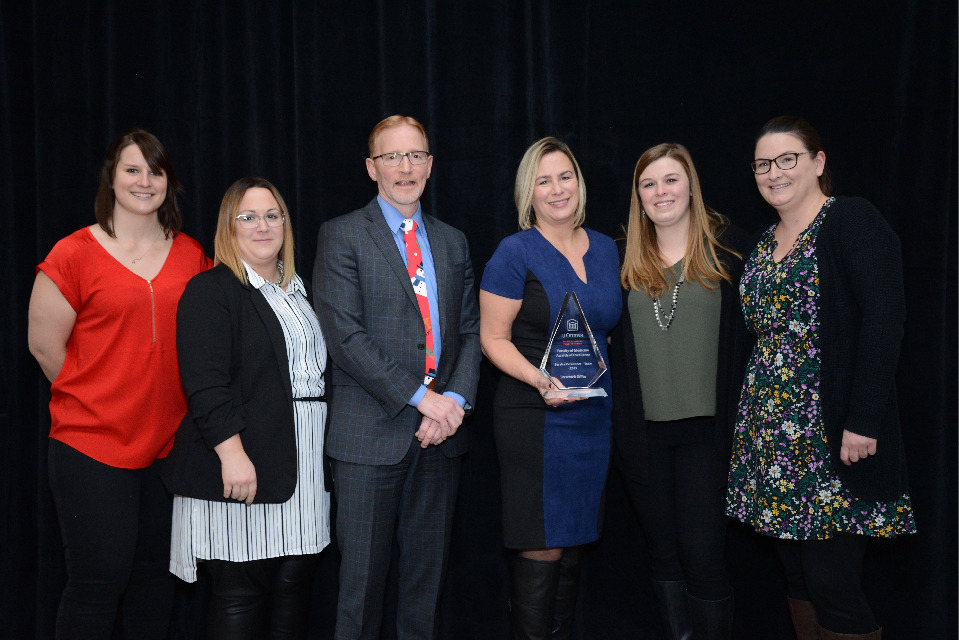Dr. Jasmin, Dean of the Faculty of Medicine, with members of the Research and Innovation office, winner of the 2019 Team Service Excellence award.