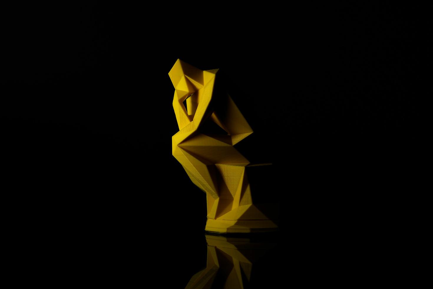 The Thinker made of geometric shapes