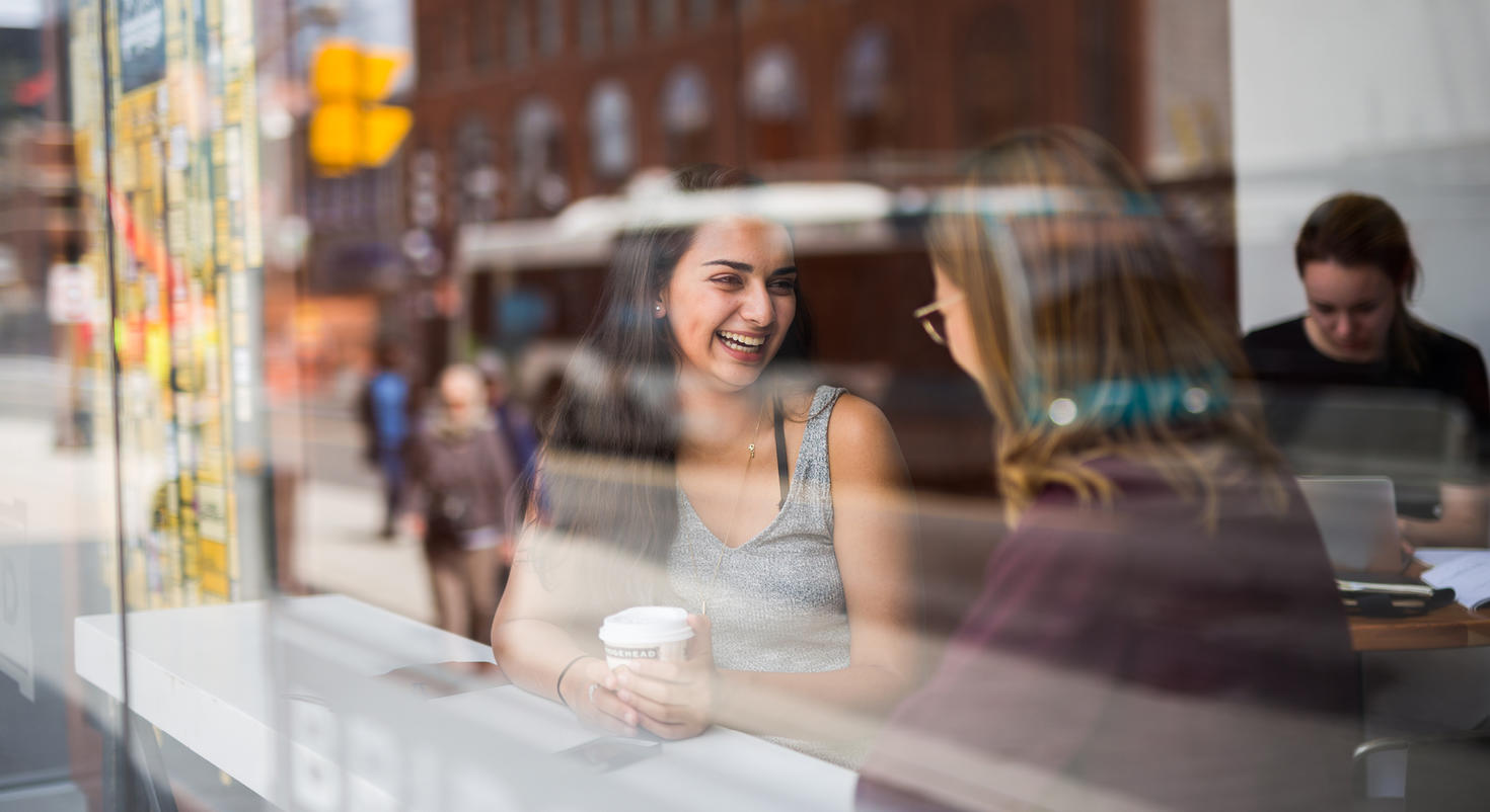 Two women discussing.