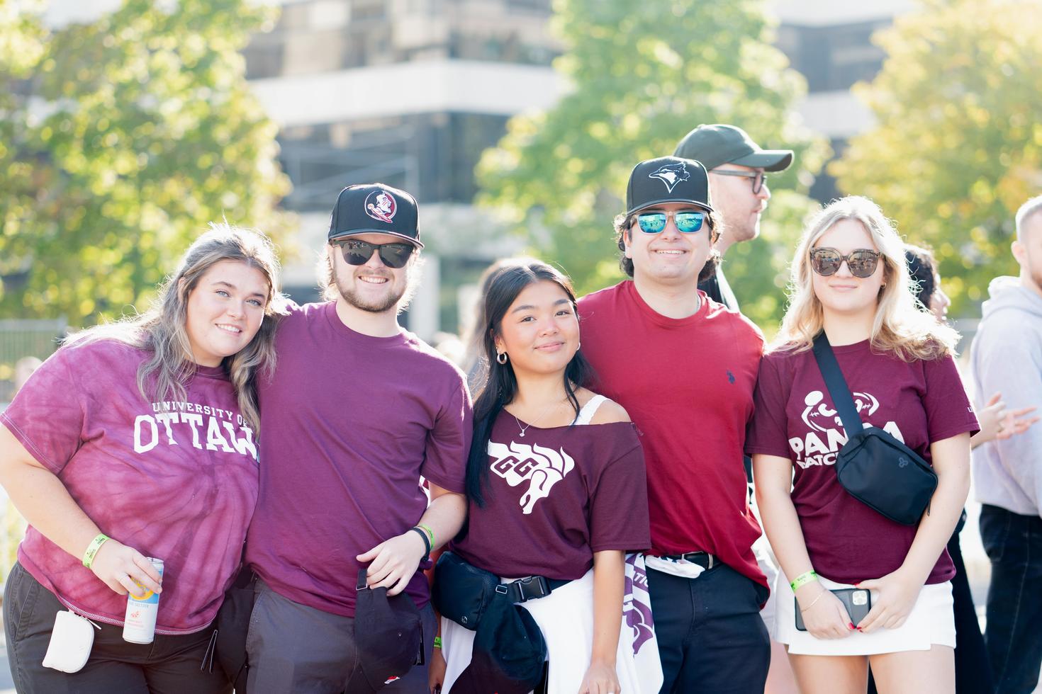 Group of students in branded clothing